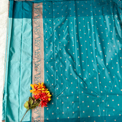 Turquoise Tranquility: Copper Zari Weaved Semi Silk Saree