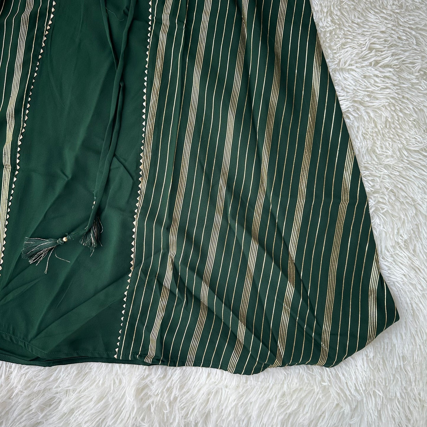 Embrace Festive Finesse: Green Crepe Foil Printed A-Line Kurta