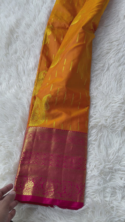 The Energetic Orange Yellow Semi Silk Saree With Rich Red border