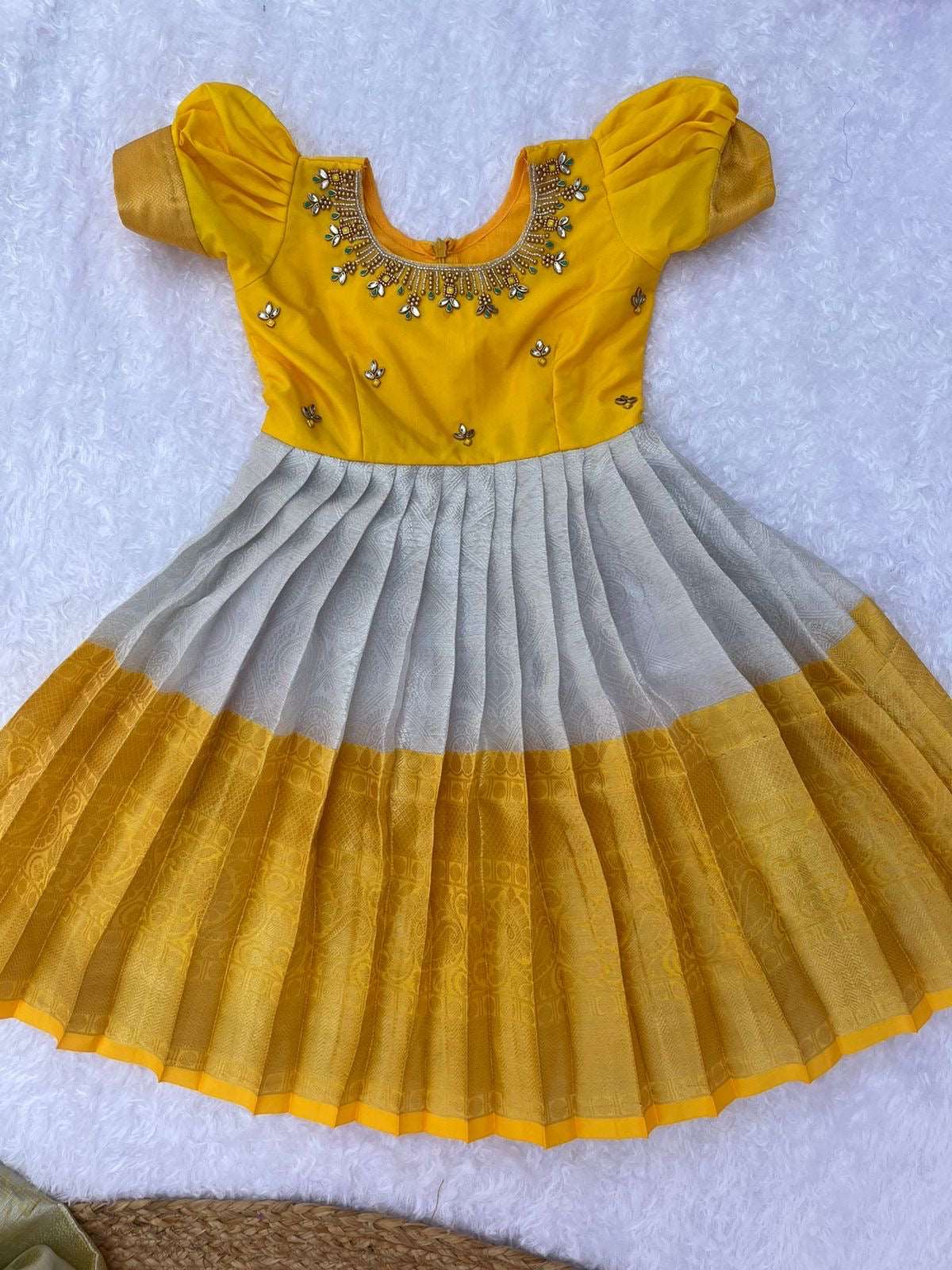 Radiant Elegance: Silver and Yellow Frock with Aari Work