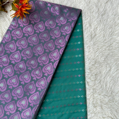 Luxurious Drapes: Green Soft Silk Saree for Stunning Comfort and Style